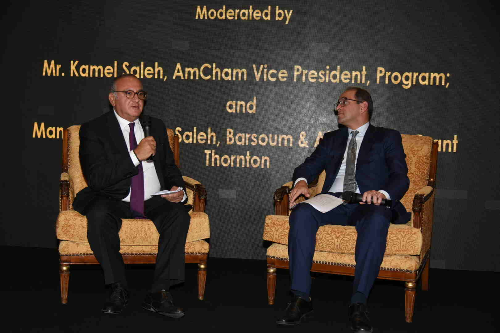 Kamel Saleh moderates discussion with Minister of Finance at AmCham